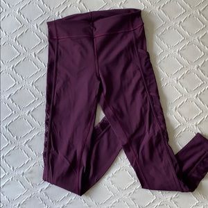 Lululemon purple leggings with mesh side panel